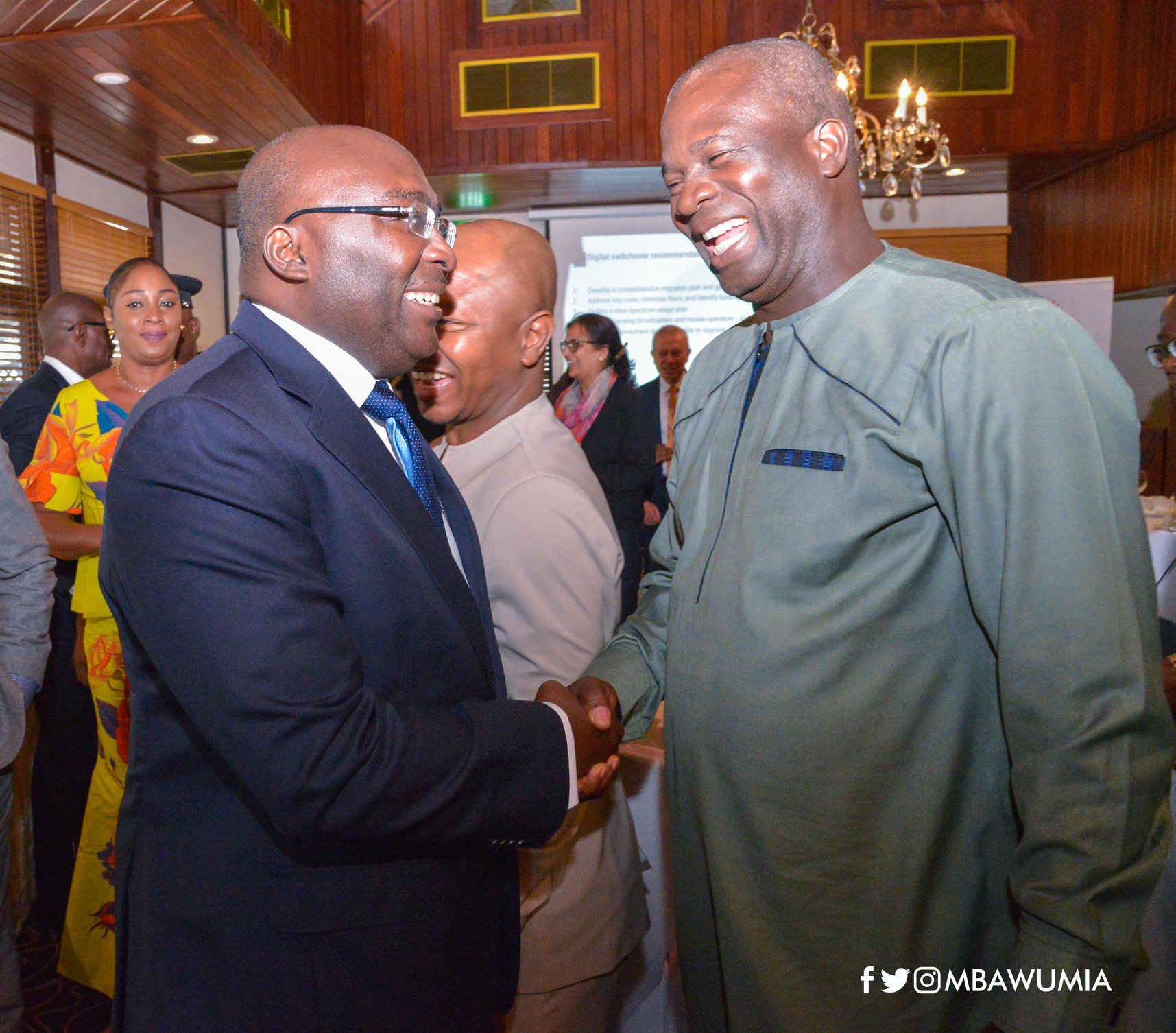 10.-Vice-President-interacting-with-a-member-of-the-Parliamentary-Select-Committee- Vice President's Comment on the Mobile Telecom Industry Breakfast Meeting